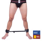 Barre en métal réglable avec menottes en cuir - 35 à 60cm Barre en métal réglable avec menottes en cuir - 35 à 60cm